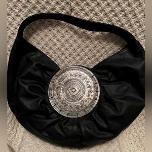 Chico’s black leather medallion hobo